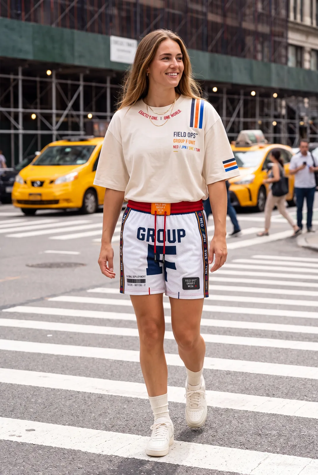 Tee and shorts on a crosswalk.