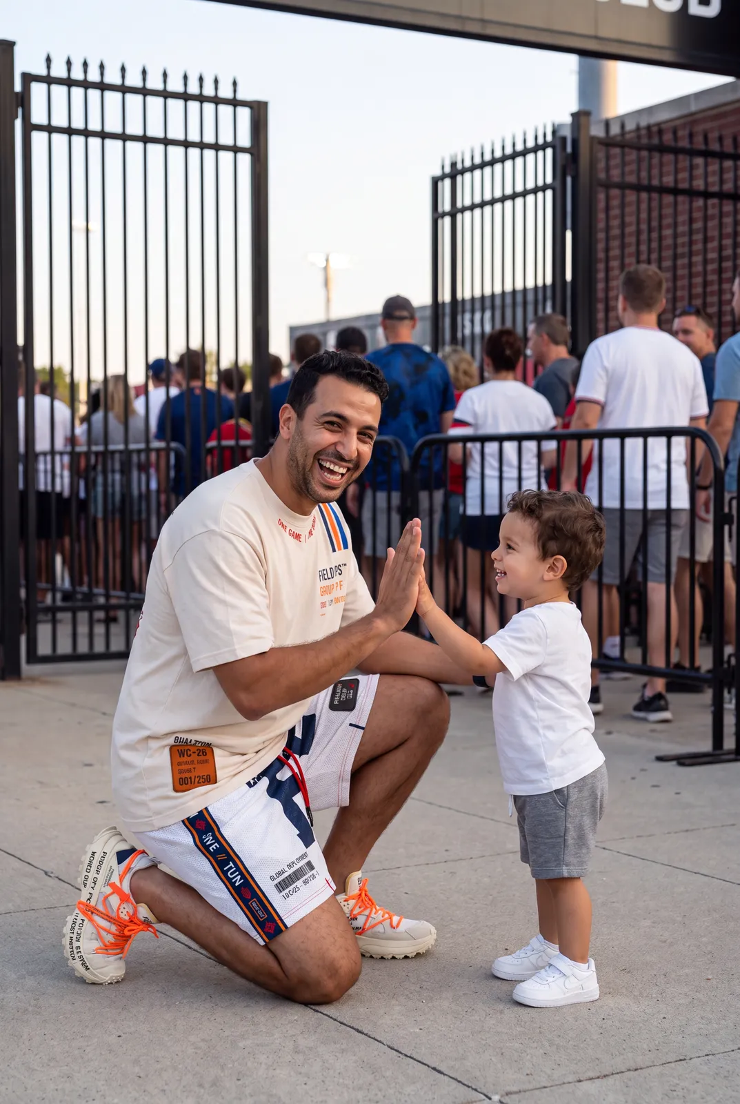 High five at the stadium gate.
