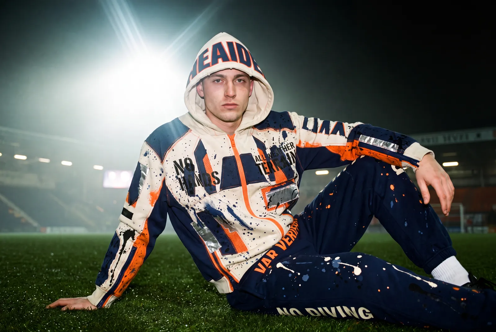 FIELD OPS HEADER Hoodie capsule. Pitch · Seated.