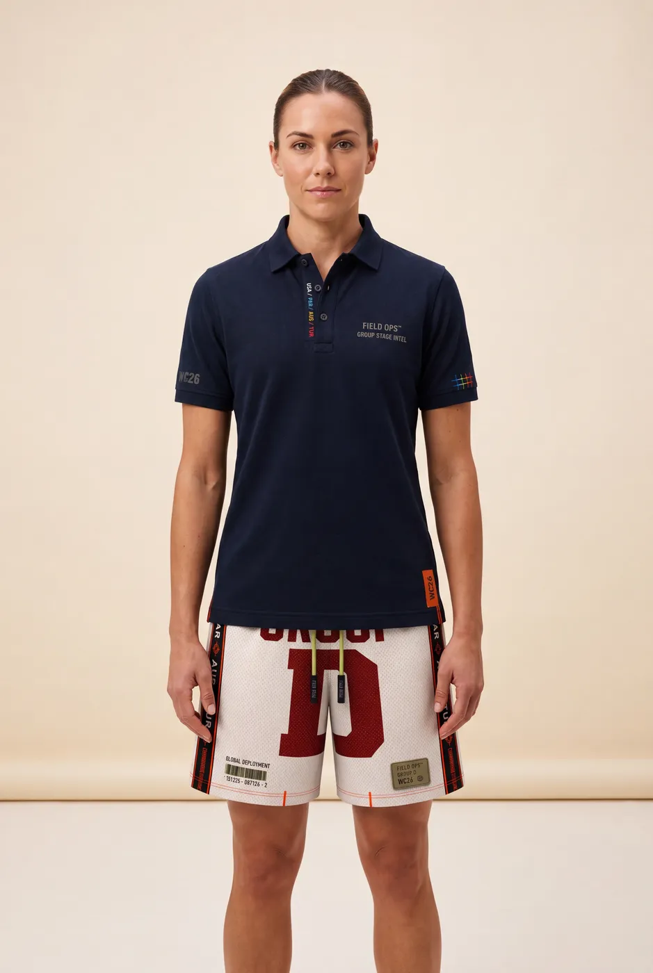 Group D shorts worn on model, studio front.