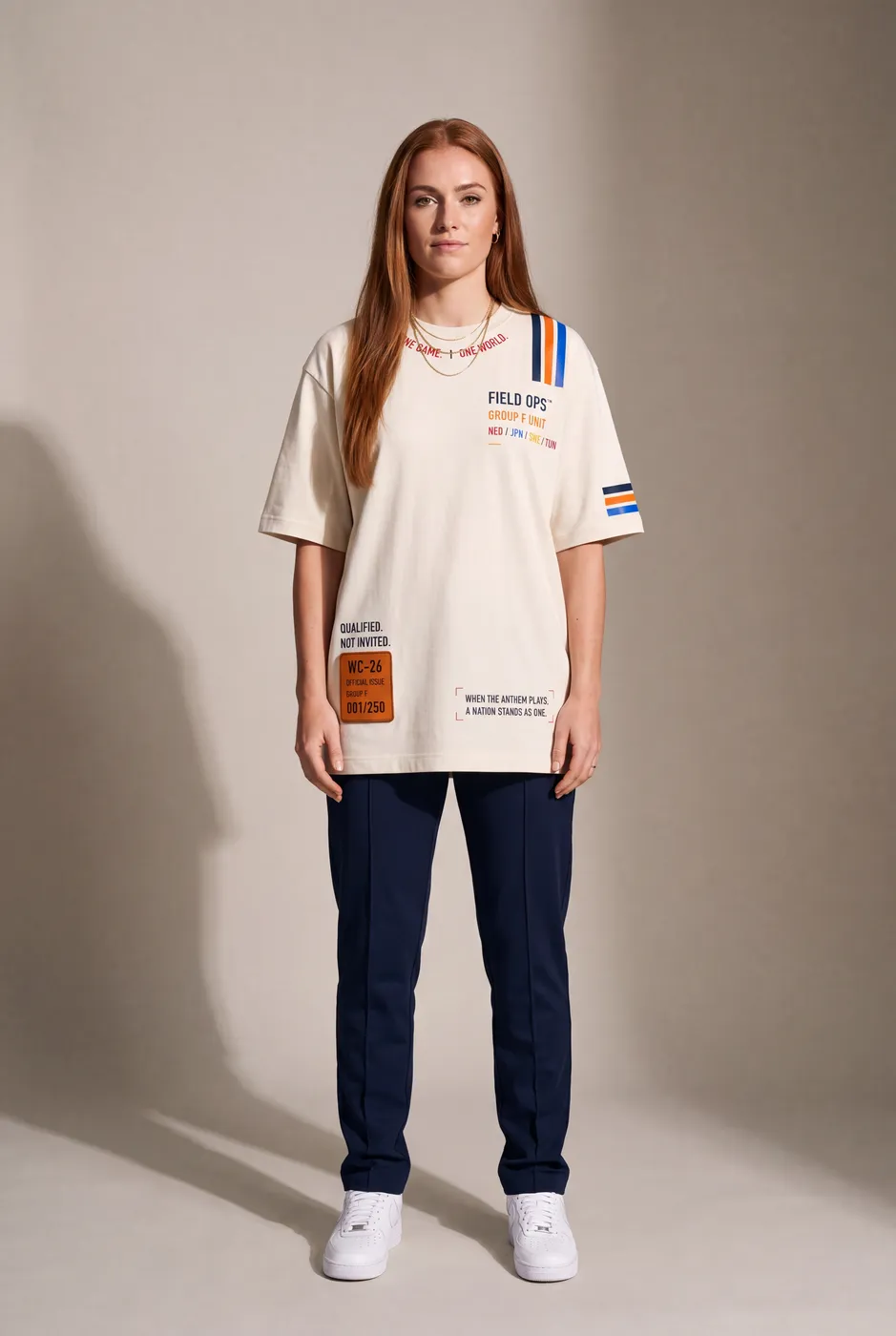 Group F tee worn on model, studio front.