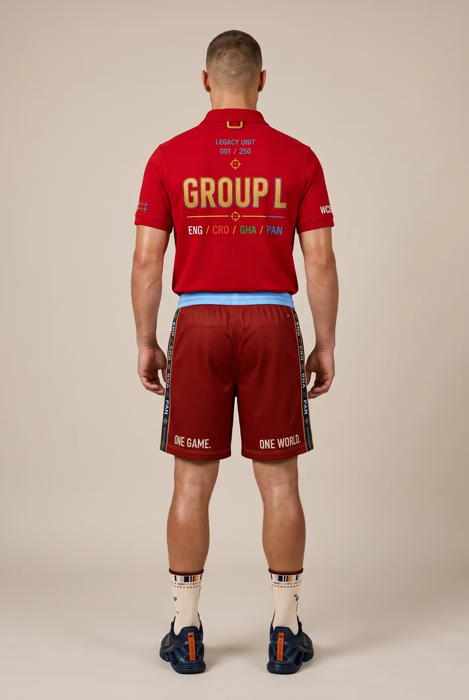 Group L polo worn on model, studio back.