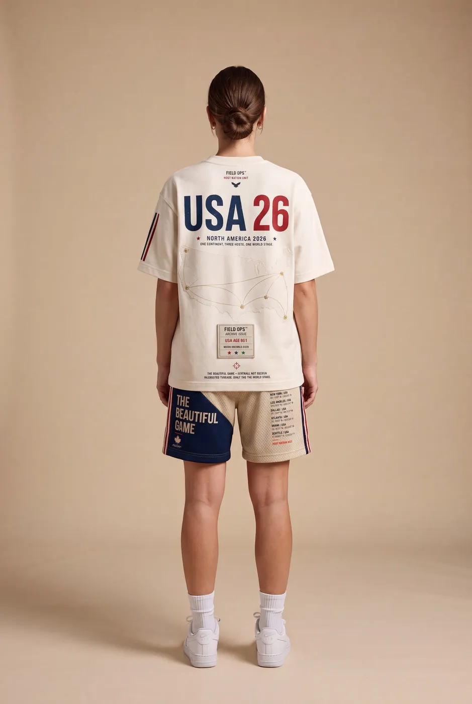 Host Nation USA shorts worn on model, studio back.